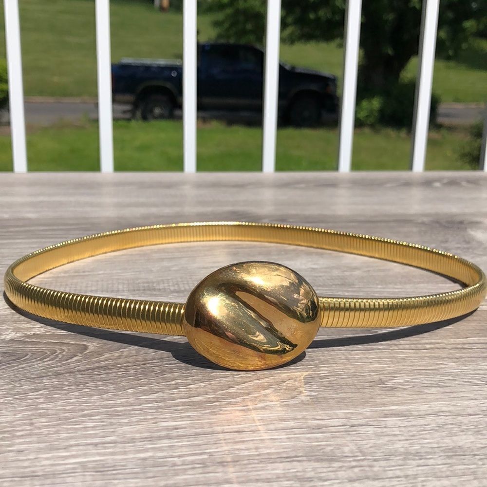 Beautiful gold tone stretchy fashion belt